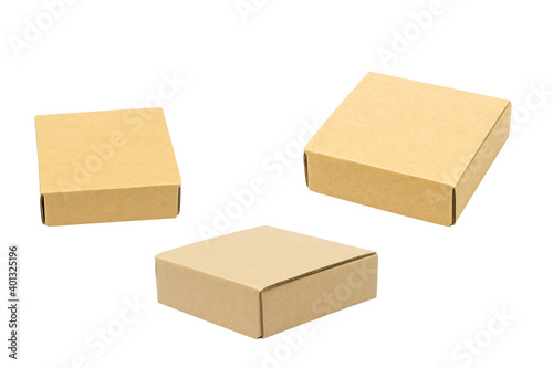 Three small shipping parcel boxes on a white background