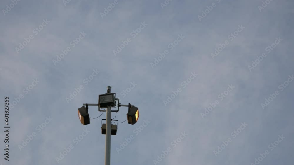 Clouds In The Sky Flying Above Light Post Outdoor - low angle, time lapse Clouds In The Sky Flying Above Light Post Outdoor - low angle, time lapse