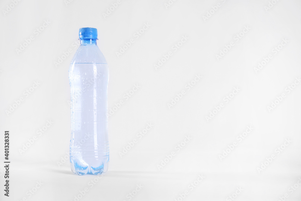 Plastic bottle with pure water isolated on white Plastic bottle with pure water isolated on white