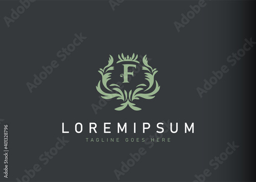 Heraldic initial letter F logo design. Vector illustration of elegant floral letter F icon design. Modern logo design with emblem style.