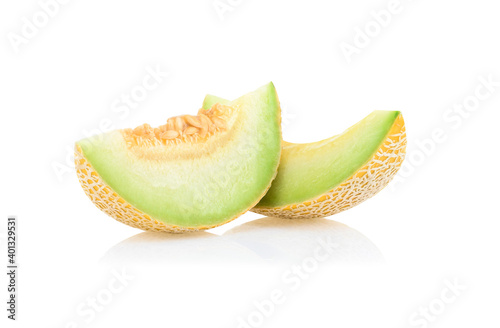 cantaloupe melon slices isolated on white background.