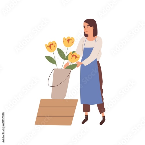 Woman florist in apron care of yellow flowers in bucket vector flat illustration. Female floral vendor with blooming plants isolated on white. Consultant of floristic shop or store