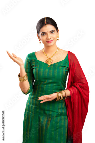 Indian young Muslim girl greeting isolated on white.