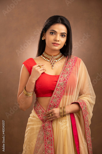 Photography Pretty Indian young Hindu girl dress up for festival.