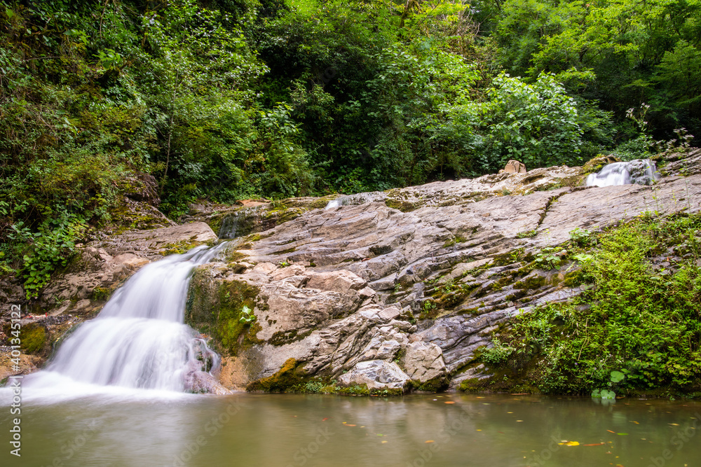 Fototapeta premium Orekhovsky Waterfall on Bezumenk's river - natural sight in the neighborhood of the city Sochi