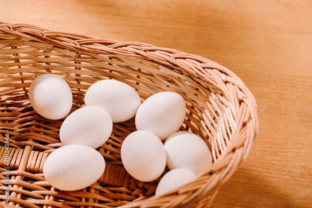 wooden basket with eggs studio shot. wooden basket with eggs studio shot.