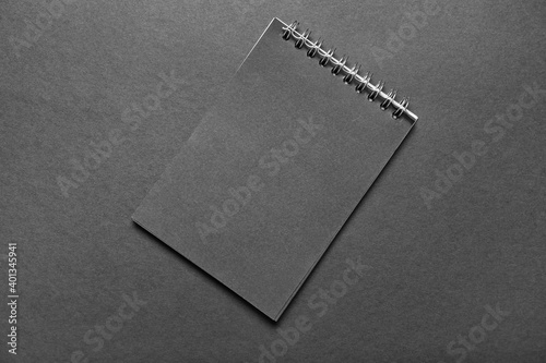 Blank black spiral notebook...