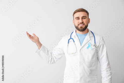 Doctor with blue ribbon on ...