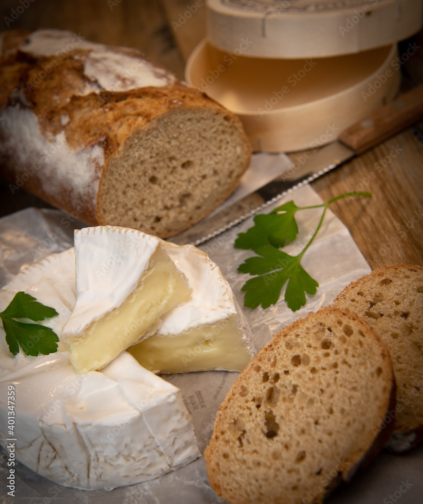 Camembert cheese on a wooden background, High quality photo Camembert cheese on a wooden background, High quality photo