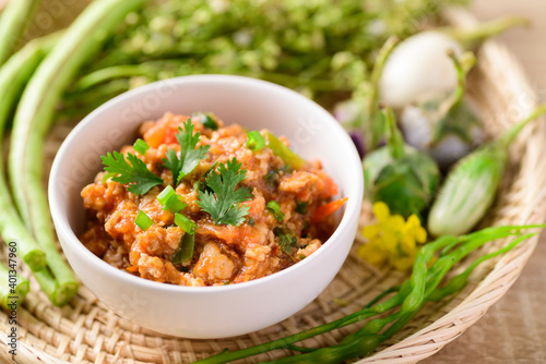 Northern Thai food (Nam Prik Ong), Spicy chili minced pork with tomatoes, Thai chili paste eating with vegetables