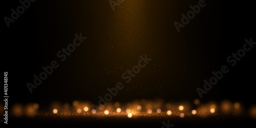 Vector golden glitter lights on dark. Abstract luxury background with glittering effect. Festive backdrop with glowing particles.	