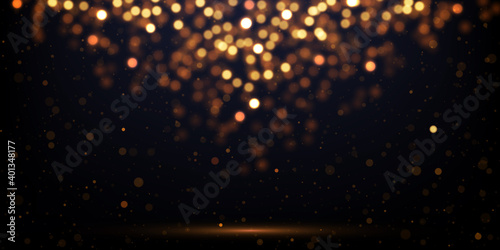 Vector golden glitter lights on dark. Abstract luxury background with glittering effect. Festive backdrop with glowing particles.	