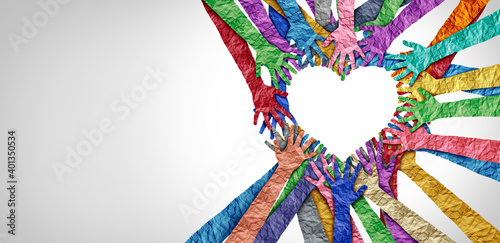 United diversity and unity partnership as heart hands in a group of diverse people connected together shaped as a support symbol expressing the feeling of teamwork and togetherness photo