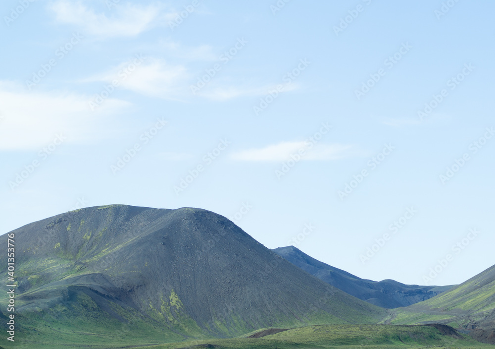 Fototapeta premium Green hills and white clouds.
