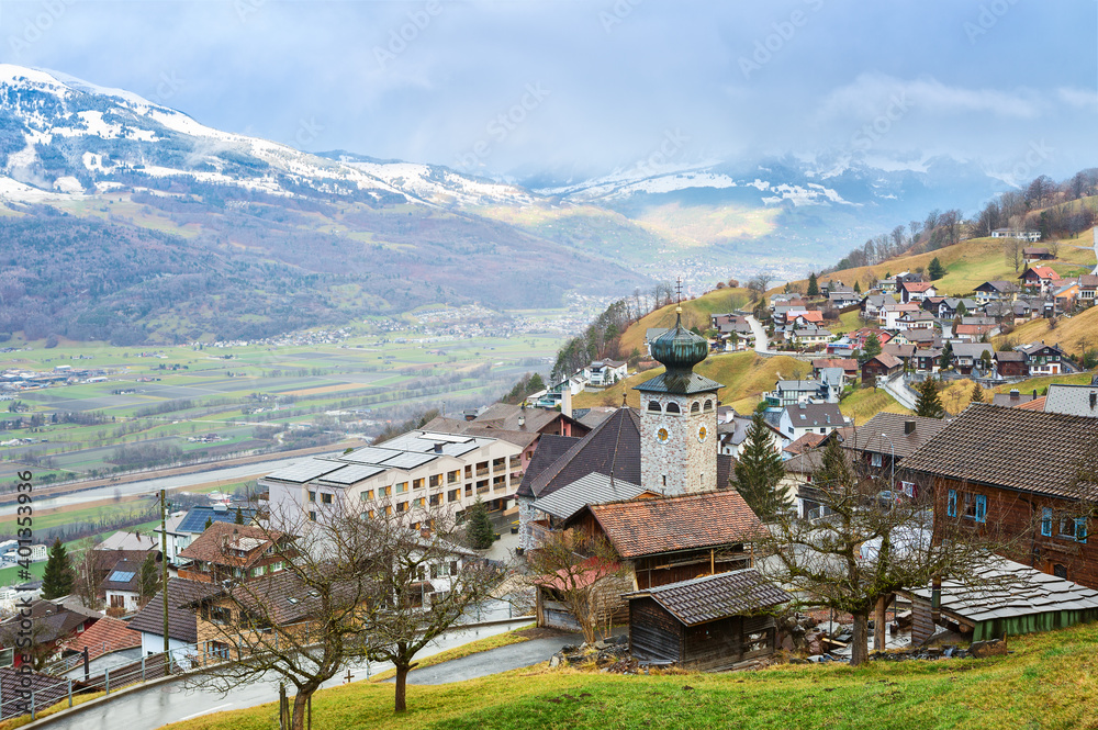 View of Triesenberg in the rain in late autumn, Liechtenstein. Triesenberg is a municipality in Liechtenstein.