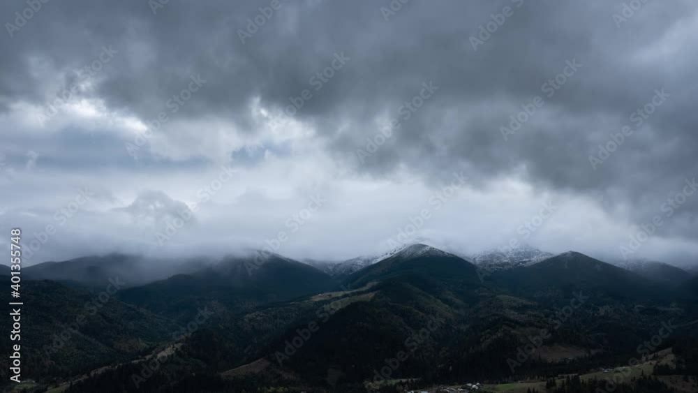 Stormy dark winter clouds mountain landscape timelapse Stormy dark winter clouds mountain landscape timelapse