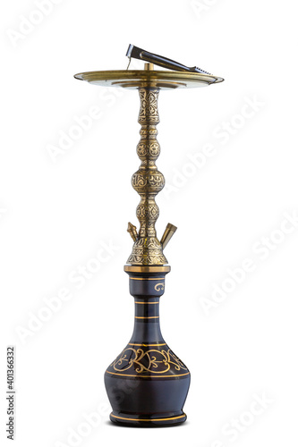 Isolated handcrafted engraved water pipe or hookah.