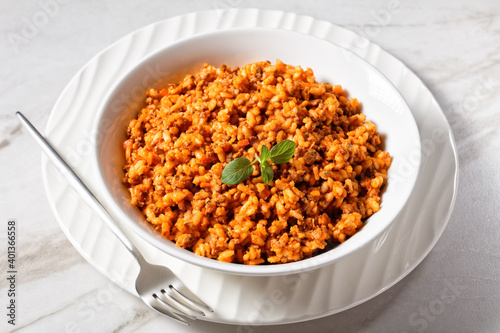 ground beef risotto bolognese in a bowl