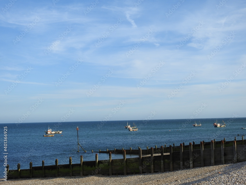 View of small boats close to land View of small boats close to land