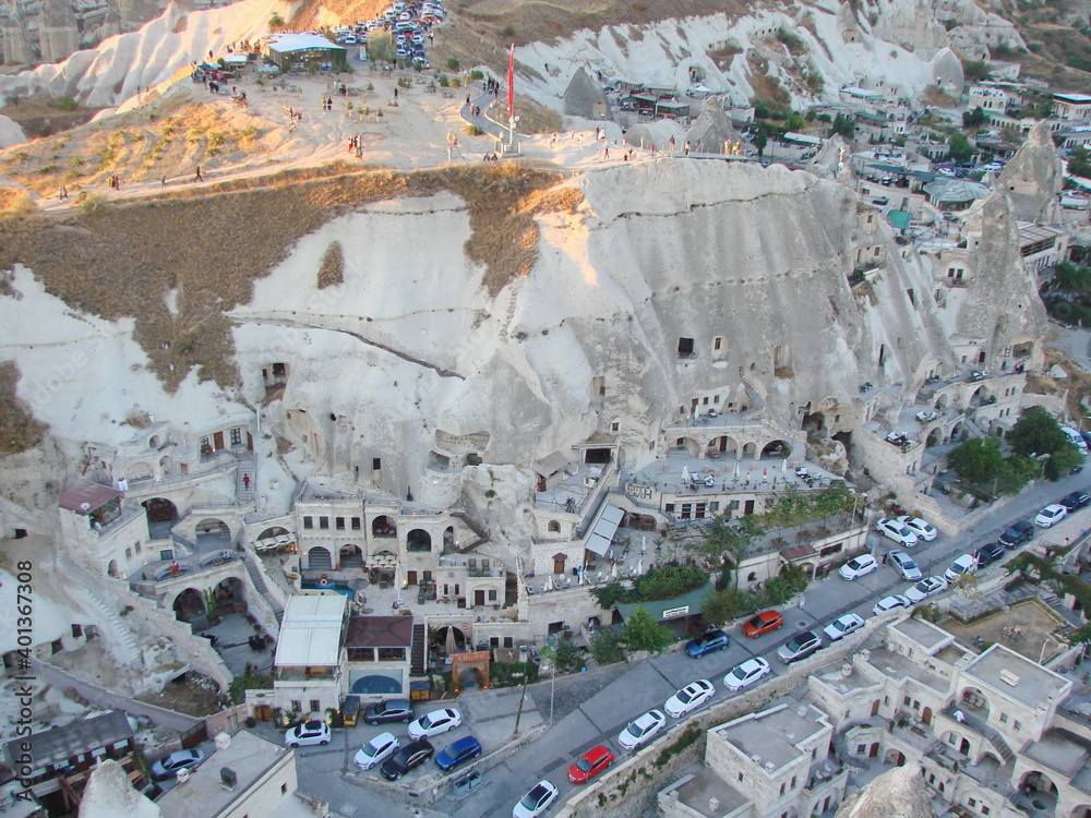Panorama from above of an incredible number of modern residential buildings built in rock caves.