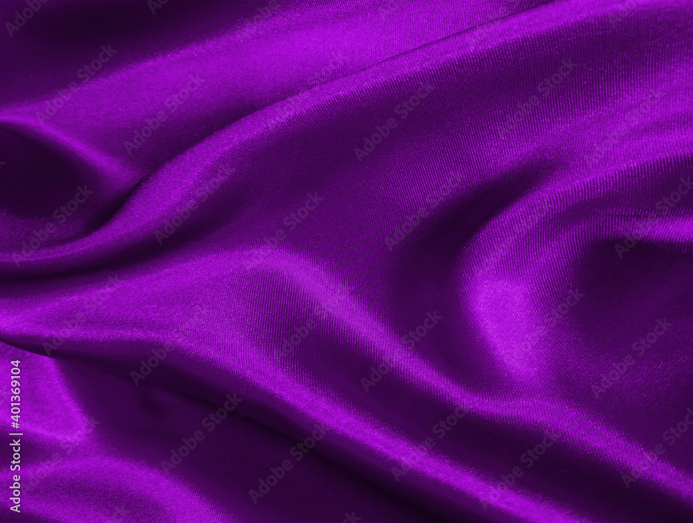 Shiny purple crumpled fabric texture. Elegant wavy cloth background Shiny purple crumpled fabric texture. Elegant wavy cloth background