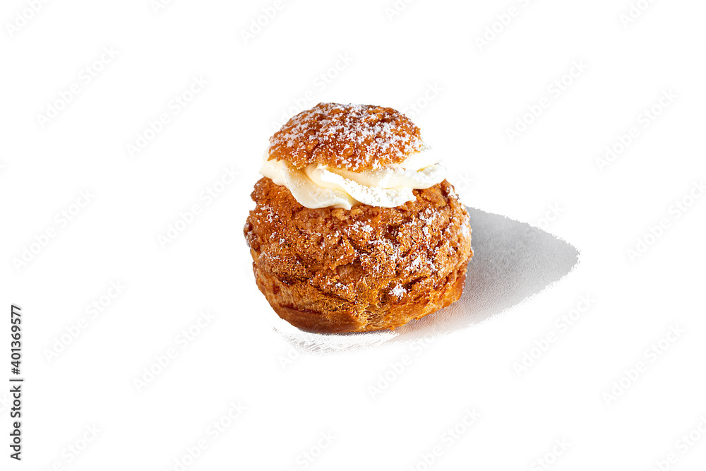 Rum baba with butter cream on a light background. Home delivery. Festive concept. Quarantine. Rum baba with butter cream on a light background. Home delivery. Festive concept. Quarantine.
