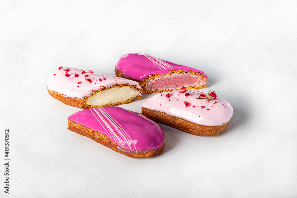 Custard cakes with butter cream on a light background. Home delivery. Festive concept. Quarantine.