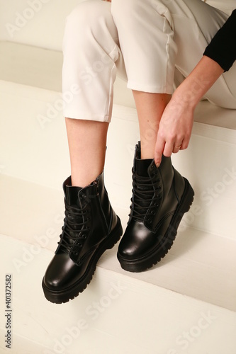 black shoes on a girl’s feet