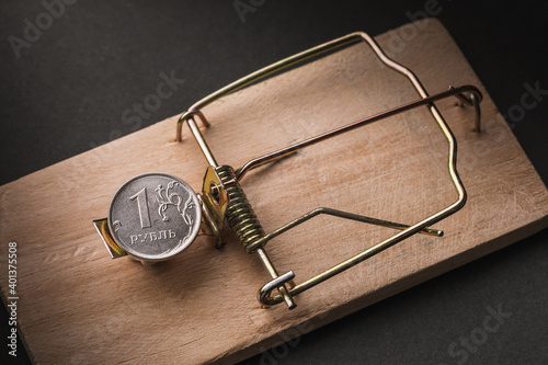 Bilde på lerret One Russian ruble in a mousetrap. Financial trap concept