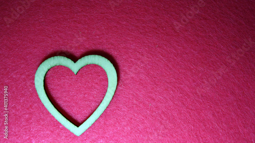 Valentine's day background with wooden heart.