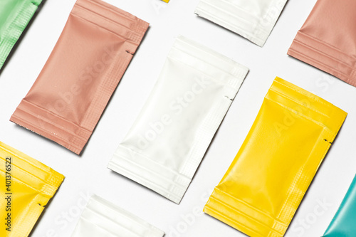 Close-up composition of colored sachets on a white background. photo