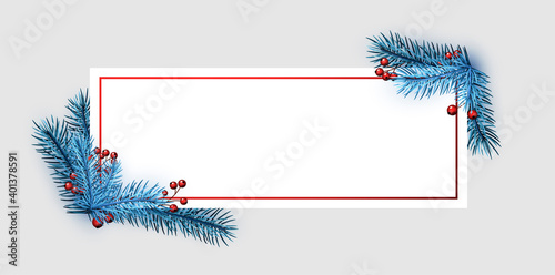 Square frame with blue spruce branches.