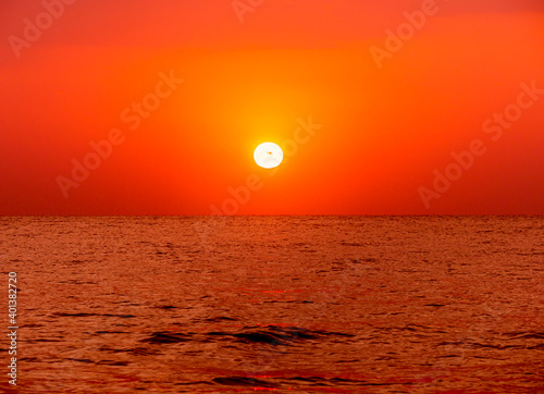 Fototapeta Naklejka Na Ścianę i Meble -  big sun over sea sunrise