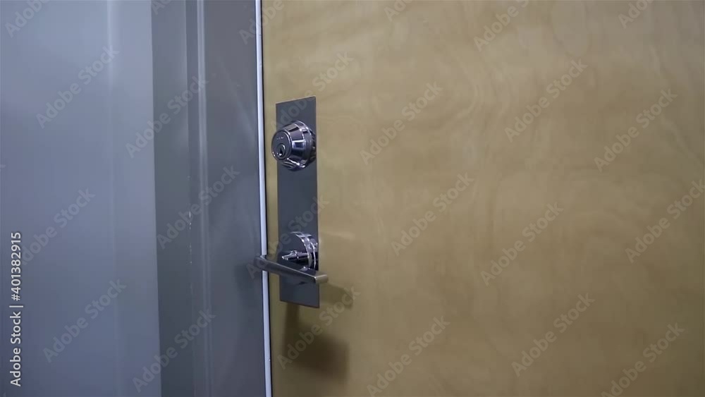 Woman opening apartment door Woman opening apartment door