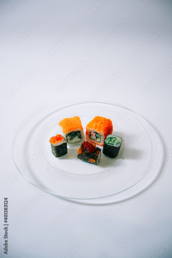 set of sushi on a plate set of sushi on a plate