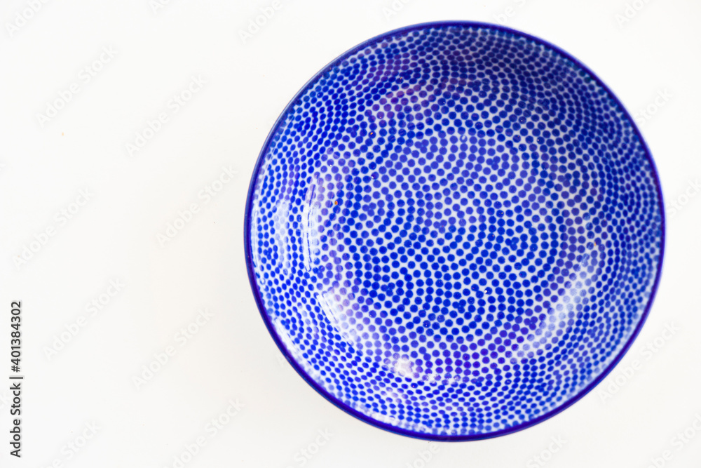 Blue empty bowl on the white background, geometry design Blue empty bowl on the white background, geometry design