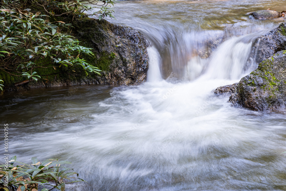 Fototapeta premium Waterfall in forest at Chae Son Nation park, Northern, Thailand.