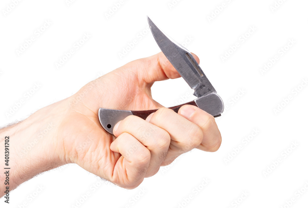 Sharp metal pocket knife in hand Sharp metal pocket knife in hand