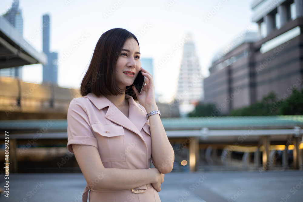 Happy asian beautiful business woman outdoor