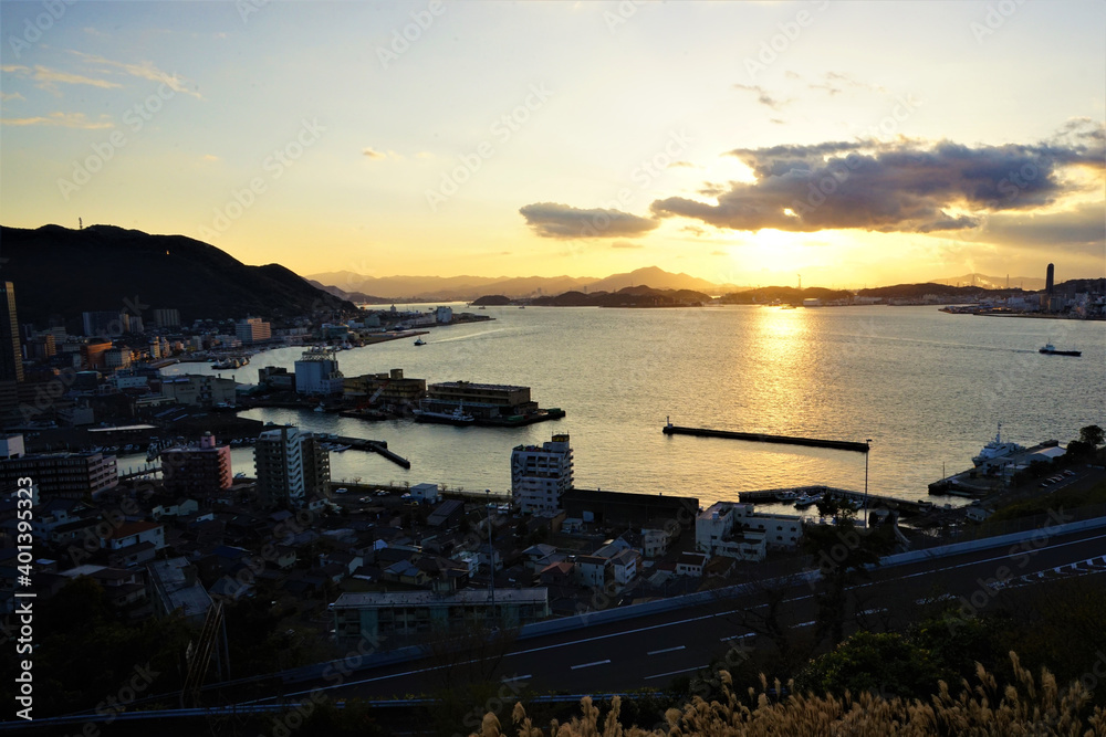 View of Moji retro town and sea from above with sunset in Shimonoseki, Fukuoka, Kitakyushu, Japan - 門司港レトロ 夕日の景色 View of Moji retro town and sea from above with sunset in Shimonoseki, Fukuoka, Kitakyushu, Japan - 門司港レトロ 夕日の景色