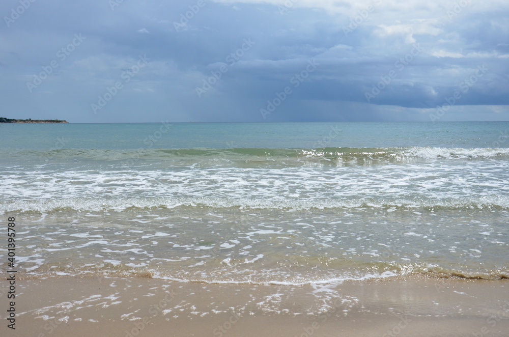Ravda, Bulgaria. May 20 2014. calm Black Sea with clear water under storm clouds