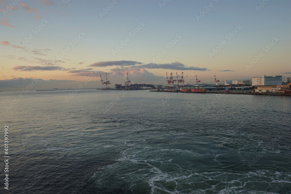 Panoramic view of Large industrial port cranes at Kobe port, Hyogo, Japan - 兵庫 神戸港付近の工業地帯 日の出と海