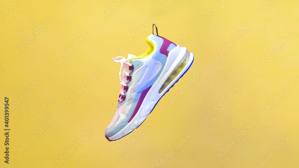Spinning sports shoe concept, white shoes with a blend of colorful lines. Sport shoe rotation isolated on yellow background. Blue and red lighting from the side of the shoe. illustration of sport shoe