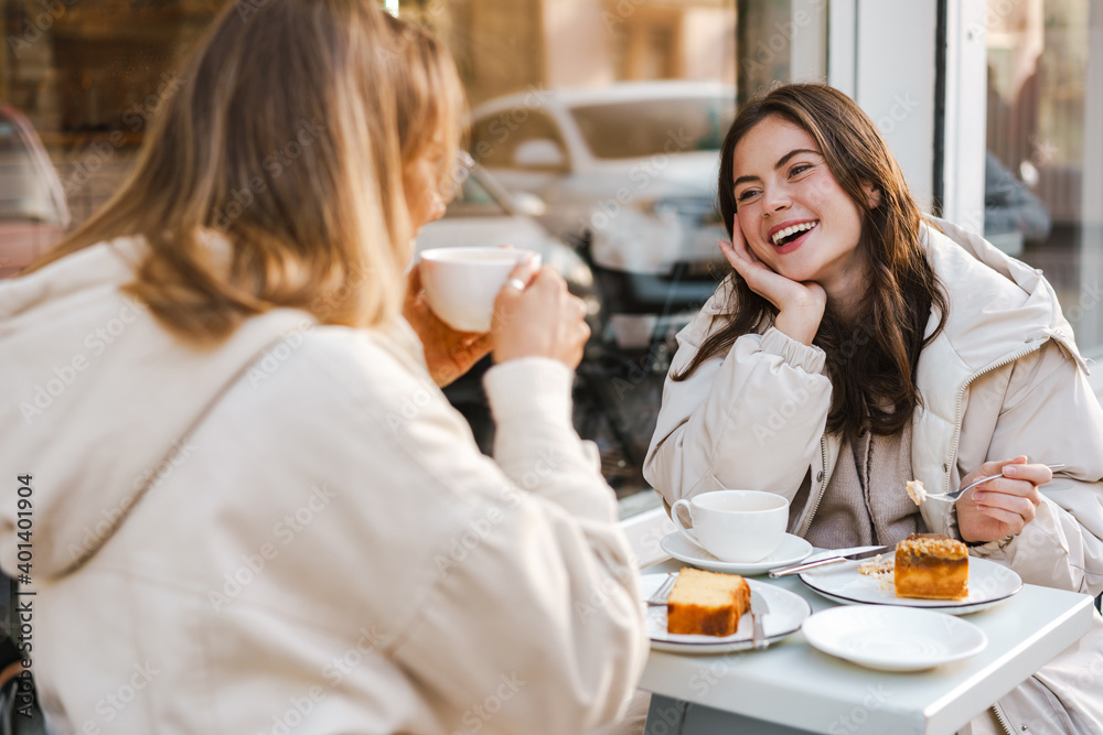 Two attractive young women having lunch at the cafe Two attractive young women having lunch at the cafe