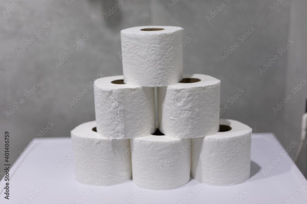 Rolls of toilet paper in bathroom at home Rolls of toilet paper in bathroom at home
