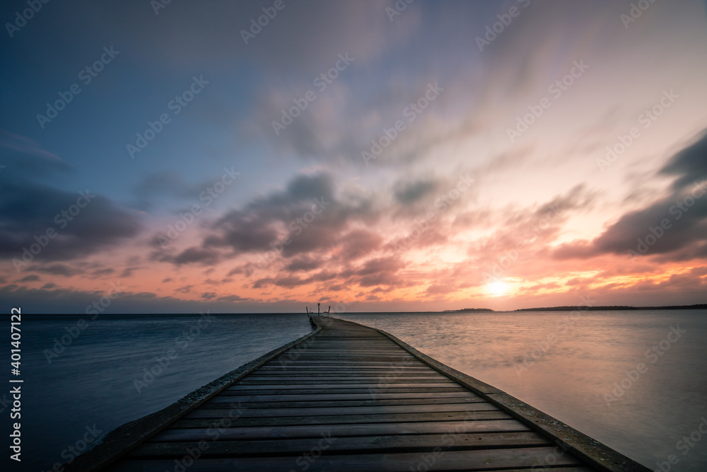 Sweden lake or Sweden sea, sunrise clouds and long exposure of a landscape shot in Scandinavia Sweden house

