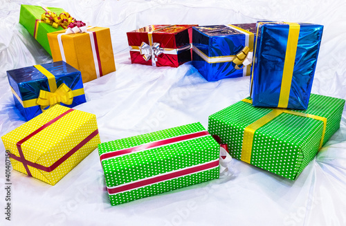 colorful gift boxes on stilized snow photo