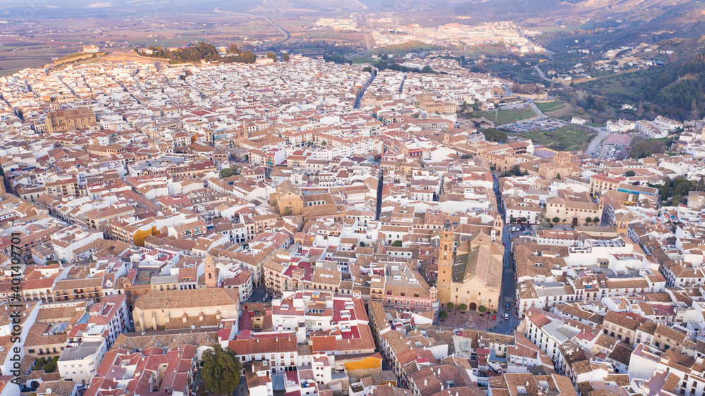 Obraz premium Typical Andalusian town seen from above aerial drone view in Antequera