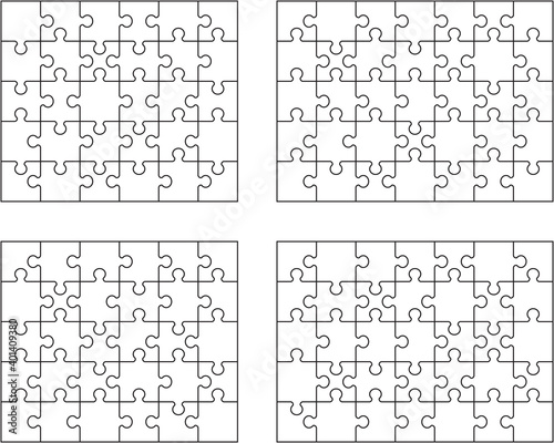 Illustration of four different white puzzles, separate pieces 