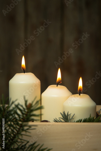 Wooden box christmas centerpiece. Simple and small home decoration with candles in wooden box. 